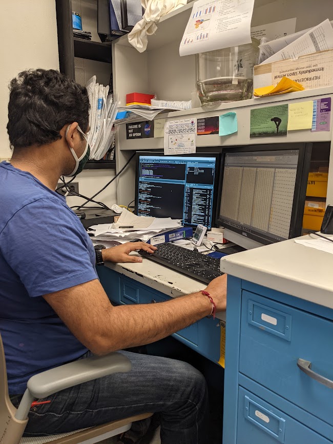 man at desk with data